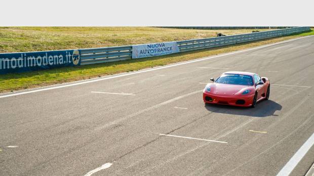 At the Autodromo di Modena in the Northern Italian region of Emilia-Romagna you can take a Ferrari F430 Challenge racecar for a spin around the track. Photo credit: Paul Shio