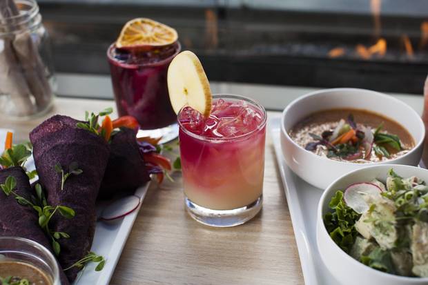 Various items including sparkling lemonade, Kimchi Salad Rolls and apple potato salad with daily soup.