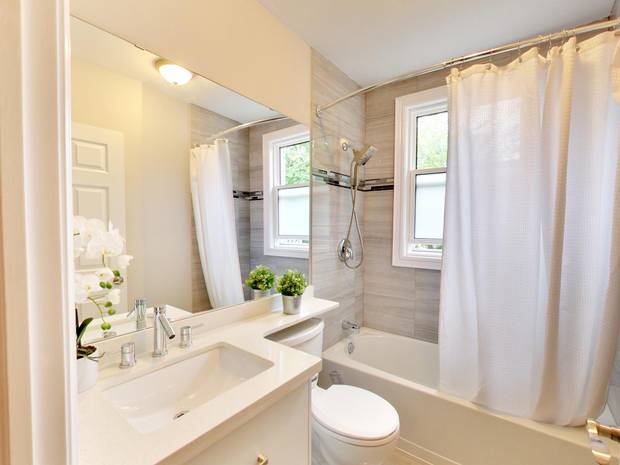 By the time the reno was finished, the semi-detached home featured a full bath among three bedrooms on the second floor.