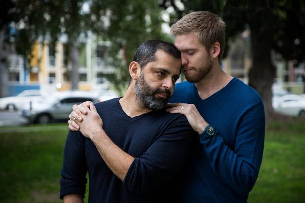 Santos Reyes, left, and his partner Trevor Carter in Sacramento, California, on Jan. 18, 2018. The couple just moved from Texas so Reyes can avoid possible deportation to El Salvador. 