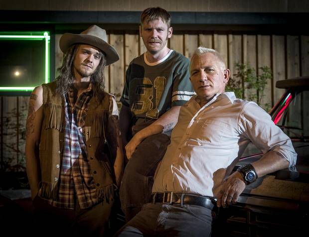 From left, Jack Quaid as Fish Bang, Brian Gleeson as Sam Bang and Daniel Craig as Joe Bang in Logan Lucky.