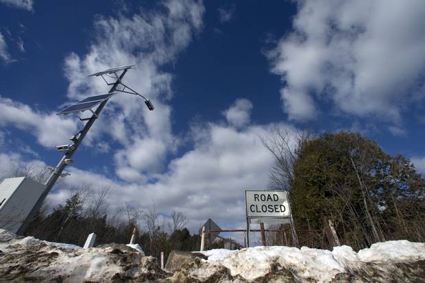 Roxham Road, along the edge of the Canada-U.S. border, is seen from Champlain, N.Y., on Feb. 19, 2017.
