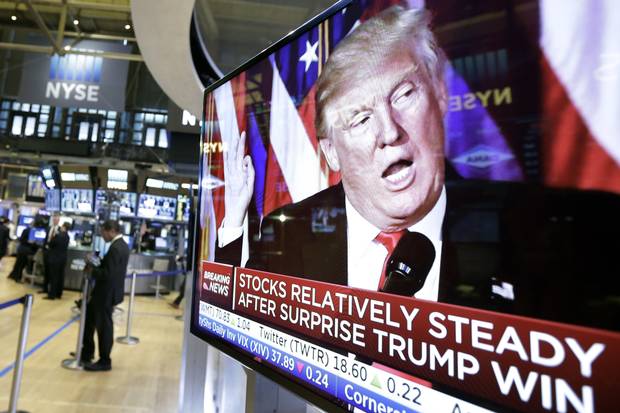 An image of president-elect Donald Trump appears on a television screen on the floor of the New York Stock Exchange on Nov. 9, 2016.
