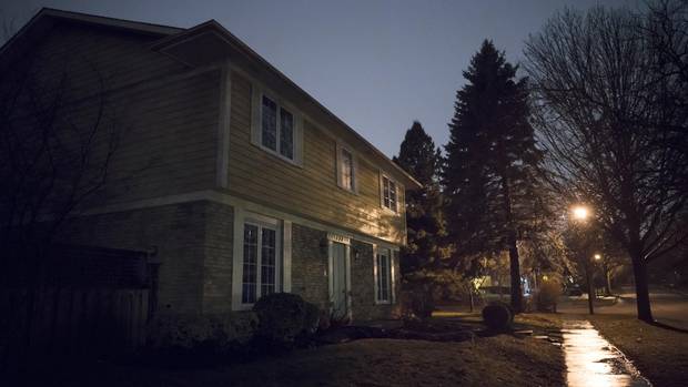 A streetlight illumines a vacant house in southeast Oakville. Local resident suspect suspect speculators, likely foreign, are behind a trend of homes selling and then sitting empty. 