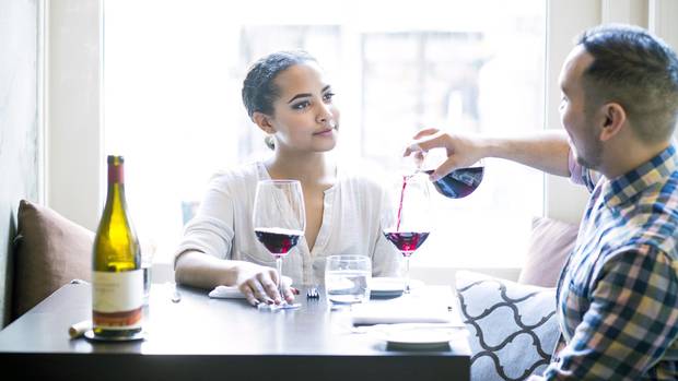 Nicole Lyclamd and Rene Alamijah enjoy a glass of wine at Blink Restaurant and Bar