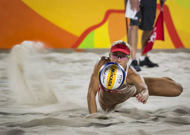 Canadian Heather Bansley in action during her preliminary beach volleyball match against team Swiss at Rio Olympics August 10, 2016. (John Lehmann/The Globe and Mail)