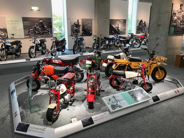 The mid-1950’s and 60’s saw Honda invest heavily in scooters, including the Monkey Z100 (front left), which was designed for kids’ amusement park rides.