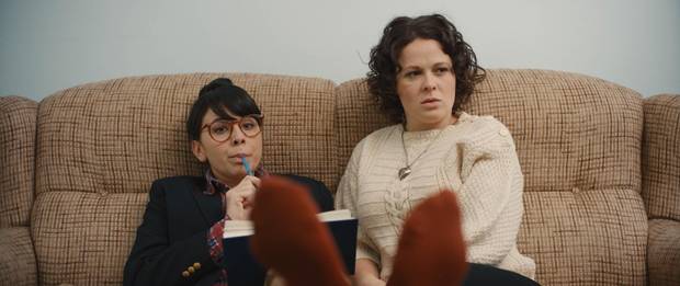 Struggling actor Audrey (Claire Armstrong) and aspiring playwright Lillian (Naomi Skwarna) lacking a proper outlet for their creativity in Dim the Flourescents, so they funnel all of their considerable passion and talent into the only paying work they can find: role-playing demonstrations for corporate seminars.