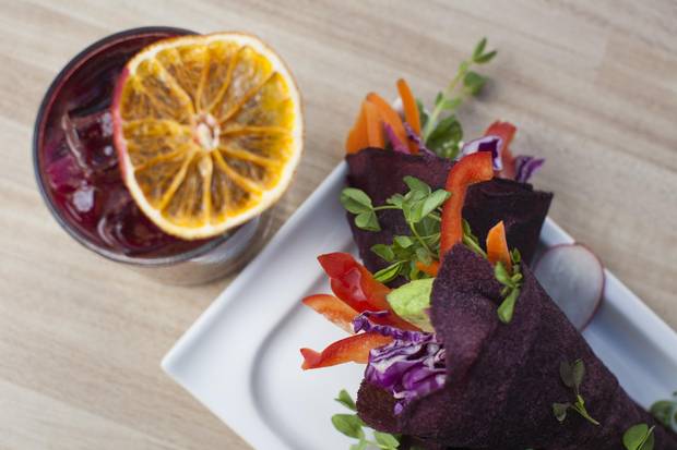 Kimchi salad rolls and Beet the Stress fresh-pressed juice.