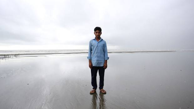 Muhammad Selim was loaded into a sampan with other migrants 