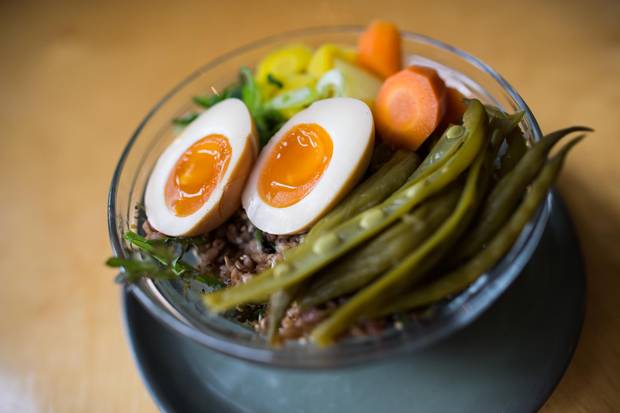 Birds & Beets’ miso barley bowl is intensely nutty, tossed with roasted carrot-sweetened dressing, tangy pickles and spicy seeds.