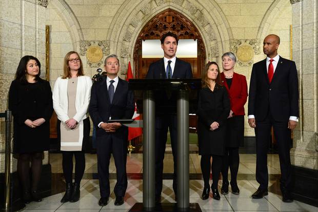 Prime Minister Justin Trudeau, middle, holds a press conference with his newly sworn in ministers on Parliament Hill on Jan 10, 2017, following a cabinet shuffle at Rideau Hall.