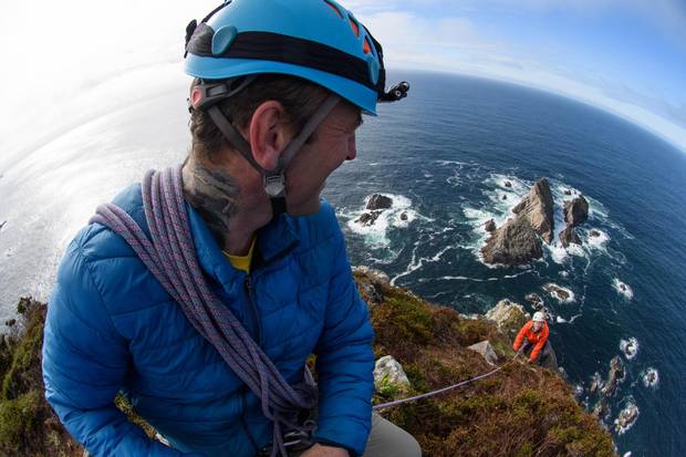 The Sturrall Headland, a dark, forbidding stack to the south, makes for a challenging climb.
