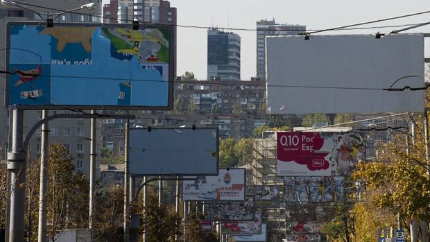Derelict billboards in Donetsk: All the turmoil has blighted a once-vibrant (and Western-oriented) economy in a city that Vlad now describes as a big ‘prison.’