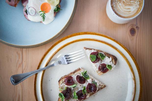 At Bows & Arrows, every dish is thoughtful, delicious and beautifully presented, such as this whipped lardo tartine with pickled cherries, served on house-made bread.