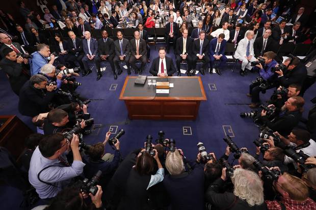 Former FBI director James Comey prepares to testify before the Senate Intelligence Committee on Capitol Hill on June 8, 2017.