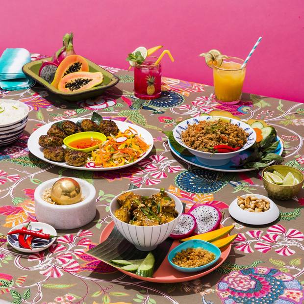 Pineapple decal glass, $4, embossed tumbler with gold rim, $6, blue melamine plate, $6, orange bamboo fibre dinner plate, $6 at Loblaws and Real Canadian Superstore (www.realcanadiansuperstore.ca). CB2 small gold stipple bowl, $8.95 at CB2 (www.cb2.com). Crate & Barrel Lina horizontal-striped cereal bowl, $16.95, Bennett dinner plate, $29.95 at Crate & Barrel (www.crateandbarrel.com). Tom Dixon mortar and pestle, price on request, Gien mini painted indigo dish, $41, Hering Berlin multi soup bowl, $245, velvet butter bowl, $85, Hering Berlin Soda 3.3 vertical-striped bowl, $145, at Hopson Grace (www.hopsongrace.com). Floral bedspread (used as tablecloth), $75, at Morningstar Trading Co. Ltd (www.morningstartrading.ca). Vintage enamel tray and straws, stylist’s own.