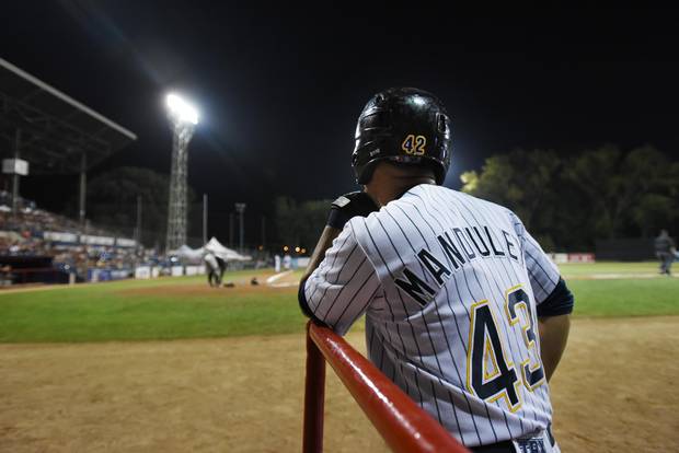 Yordan Manduley waits for his turn at the plate during game against the Garden State Grays at Stade Municipal in Quebec City. The 29-year-old hopes the Can-Am League experiment will mean to bigger and better things for his baseball future.