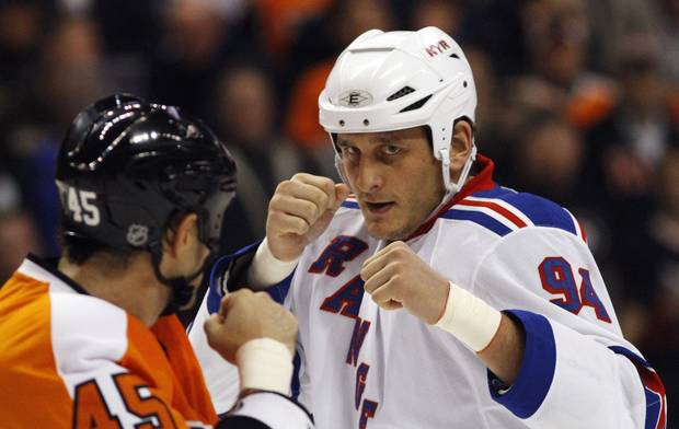 FILE - In this Nov. 4, 2010, file photo, Philadelphia Flyers' Jody Shelley, left, and New York Rangers' Derek Boogaard fight during an NHL hockey game in Philadelphia. Boogaard, at age 28, died on Friday. Boogaard signed with the Rangers as a free agent in July,2010 appearing in 22 games last season, registering one goal and one assist.