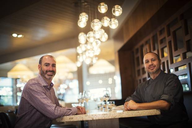 Alloy restaurant chef and owners Uri Heilik, left, and Rogelio Herrera at their restaurant in Calgary.