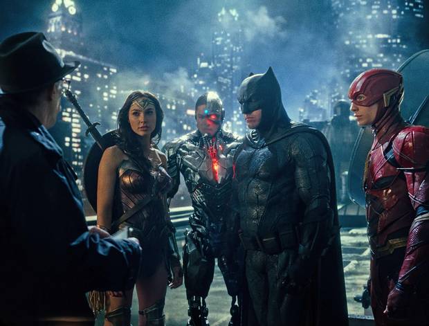 J.K. Simmons as Commissioner Gordon, Gal Gadot as Wonder Woman, Ray Fisher as Cyborg, Ben Affleck as Batman and Ezra Miller as the Flash in Justice League.