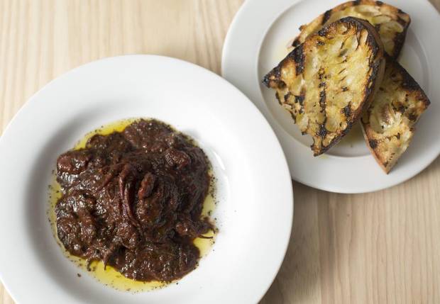 Christopher's Moscarbini, red wine brassed baby octopus with char grilled ciabatta at Uccellino.