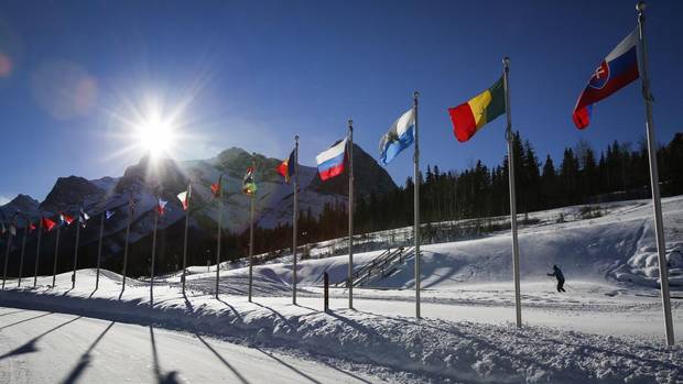 Flags from various nations fly at the Canmore Nordic Centre in Canmore, Alta.