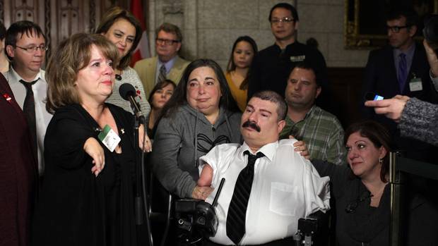 Thalidomide survivor Mercedes Benegbi speaks to the media on Dec. 1, 2014.