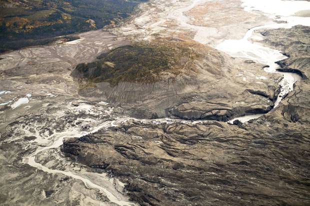A stream flows through the toe of Kaskawulsh Glacier in Yukon’s Kluane National Park. In 2016, this channel allowed the glacier's meltwater to drain in a different direction than normal, resulting in the Slims River’s water being rerouted to a different river system.