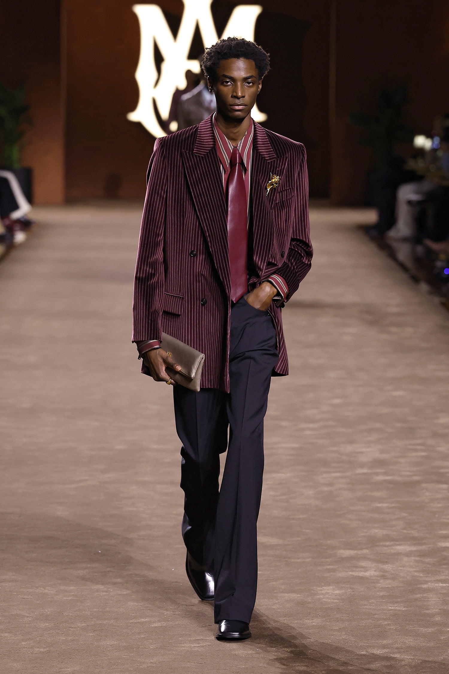 PARIS, FRANCE - JANUARY 23: (EDITORIAL USE ONLY - For Non-Editorial use please seek approval from Fashion House) A model walks the runway during the Amiri Menswear Fall-Winter 2025/2026 show as part of Paris Fashion Week on January 23, 2025 in Paris, France. (Photo by Estrop/Getty Images)