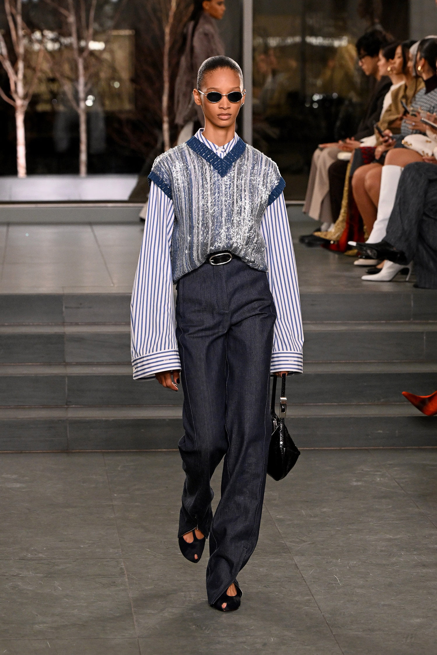 NEW YORK, NEW YORK - FEBRUARY 10: A model walks the runway wearing Tory Burch Fall/Winter 2025 during New York Fashion Week at MOMA on February 10, 2025 in New York City.  (Photo by Slaven Vlasic/Getty Images for Tory Burch)