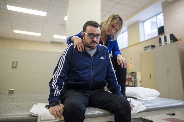 Aymen Derbali, a 41-year-old Tunisian immigrant who survived last year’s shooting at a Quebec City mosque, takes physical rehabilitation with therapist Nathalie Roberge. ‘Now I'm living in a body that feels like it's not mine,’ says Mr. Derbali, now paralyzed from the shoulders down. ‘The last steps I took were in the mosque.’