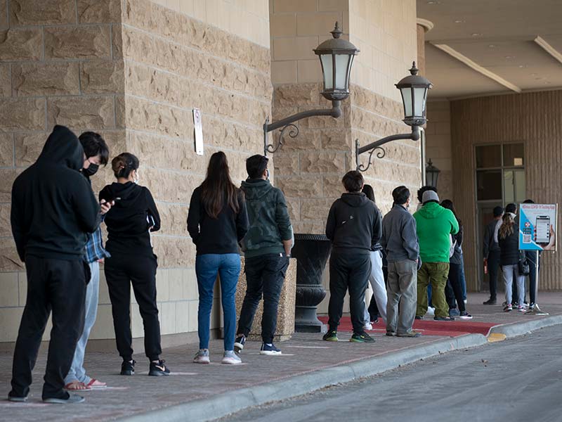 A woman arrives at a COVID-19 testing centre