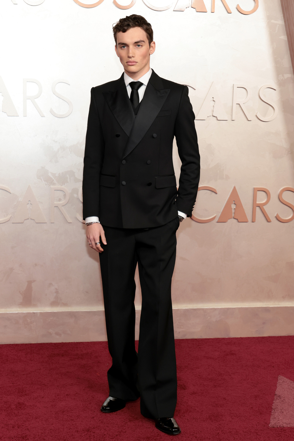 Model and TikTok creator Kit Price sports a tuxedo at
the Oscars.