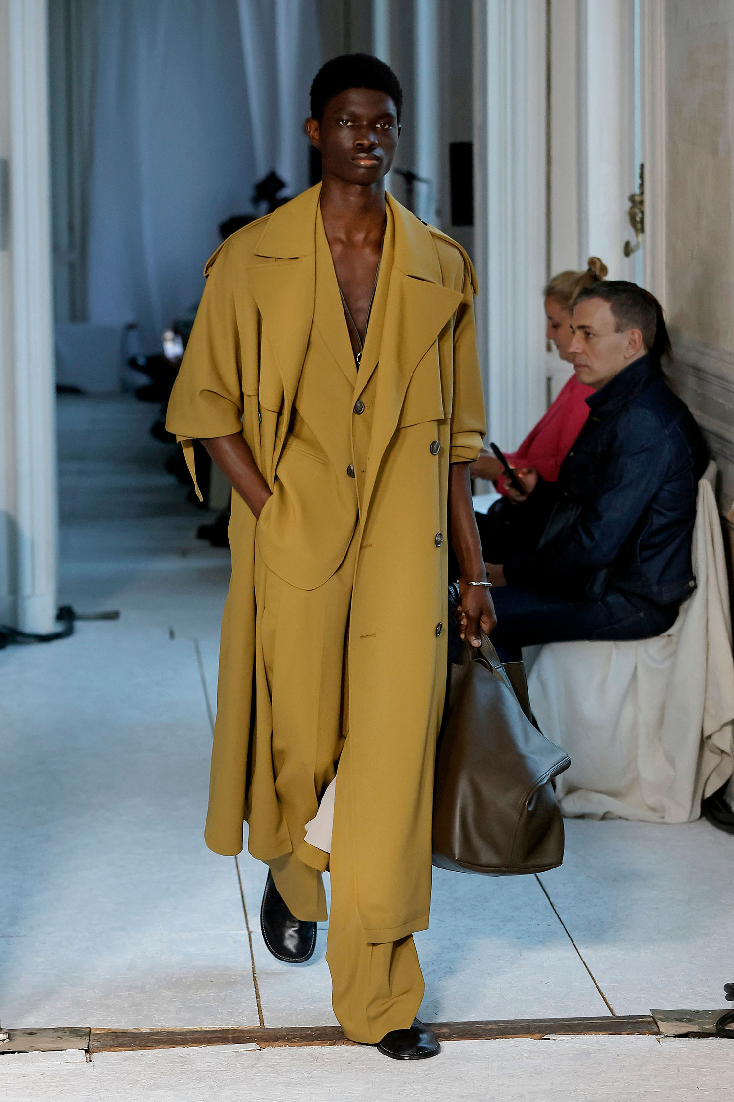 PARIS, FRANCE - JUNE 20: A model walks the runway during the AMI - Alexandre Mattiussi Menswear Spring/Summer 2025 show as part of Paris Fashion Week on June 20, 2024 in Paris, France. (Photo by Estrop/Getty Images)