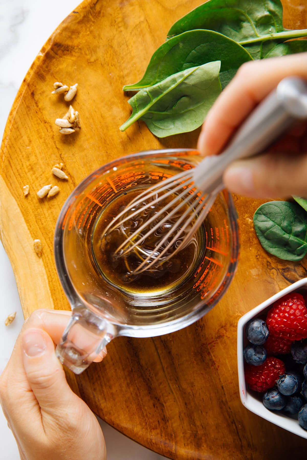 whisking salad dressing