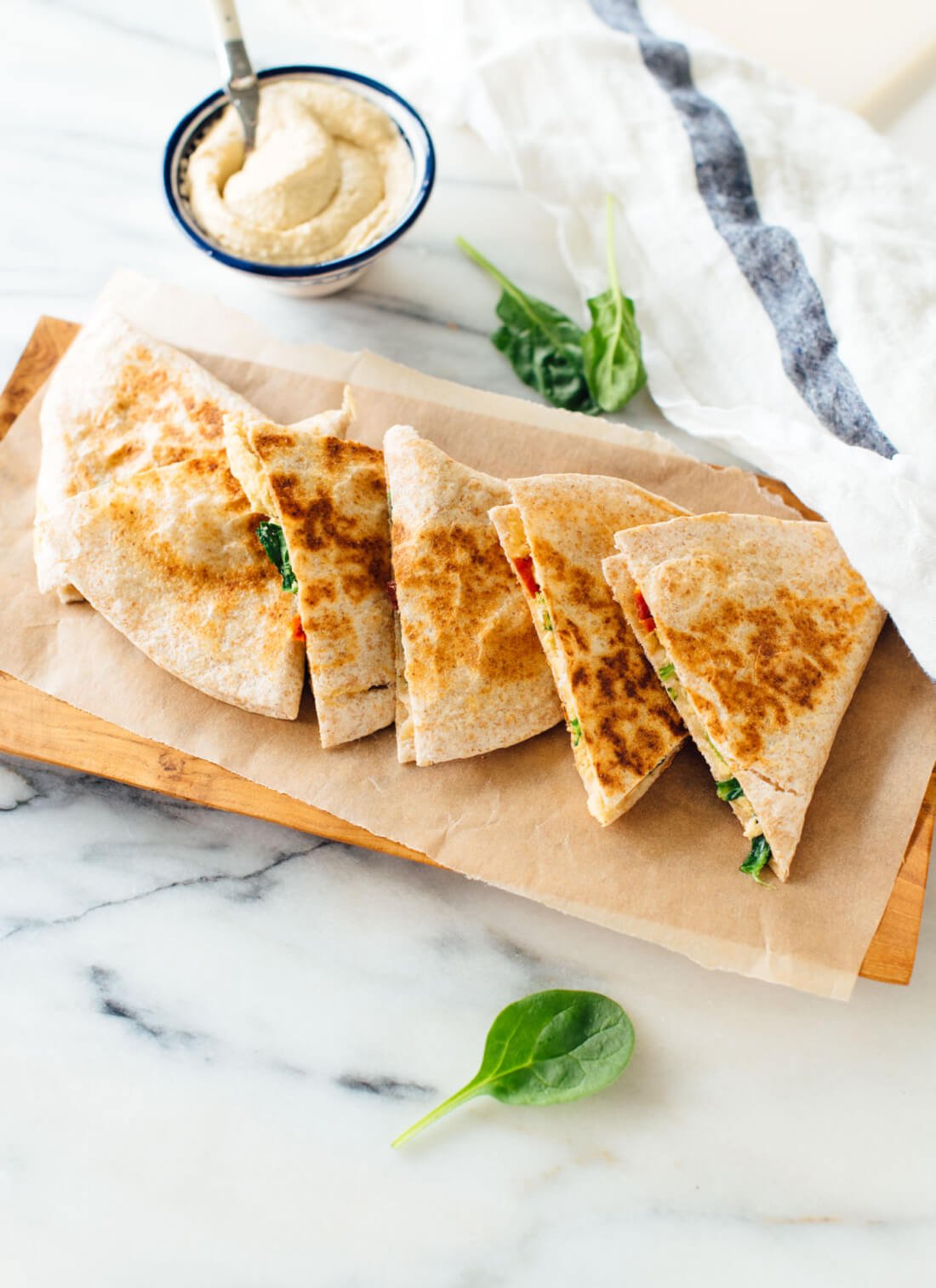This hummus quesadilla recipe is simple, quick and healthy, too! Dairy-free and vegan (also gluten-free if you use gluten-free tortillas). Get the recipe at cookieandkate.com