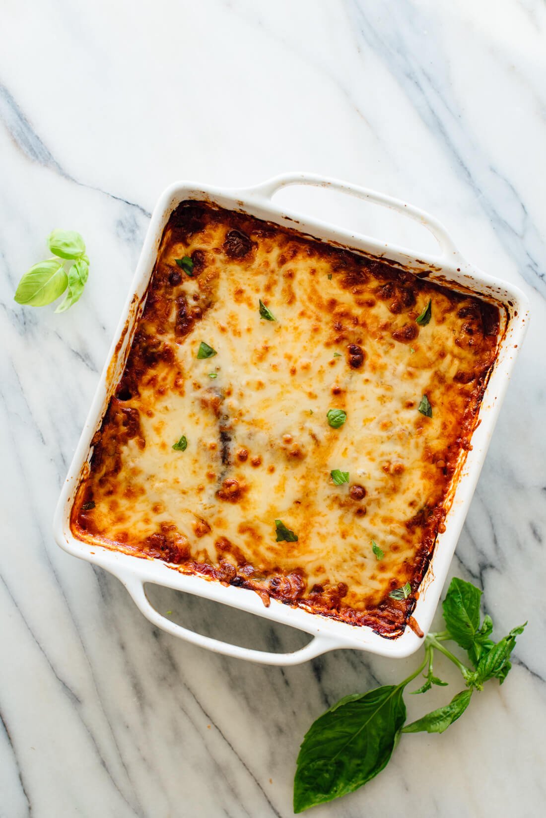 This gluten-free eggplant Parmesan recipe is easy to make. It's gluten-free because there's no breading involved in authentic Italian eggplant Parm! #glutenfree #vegetarian