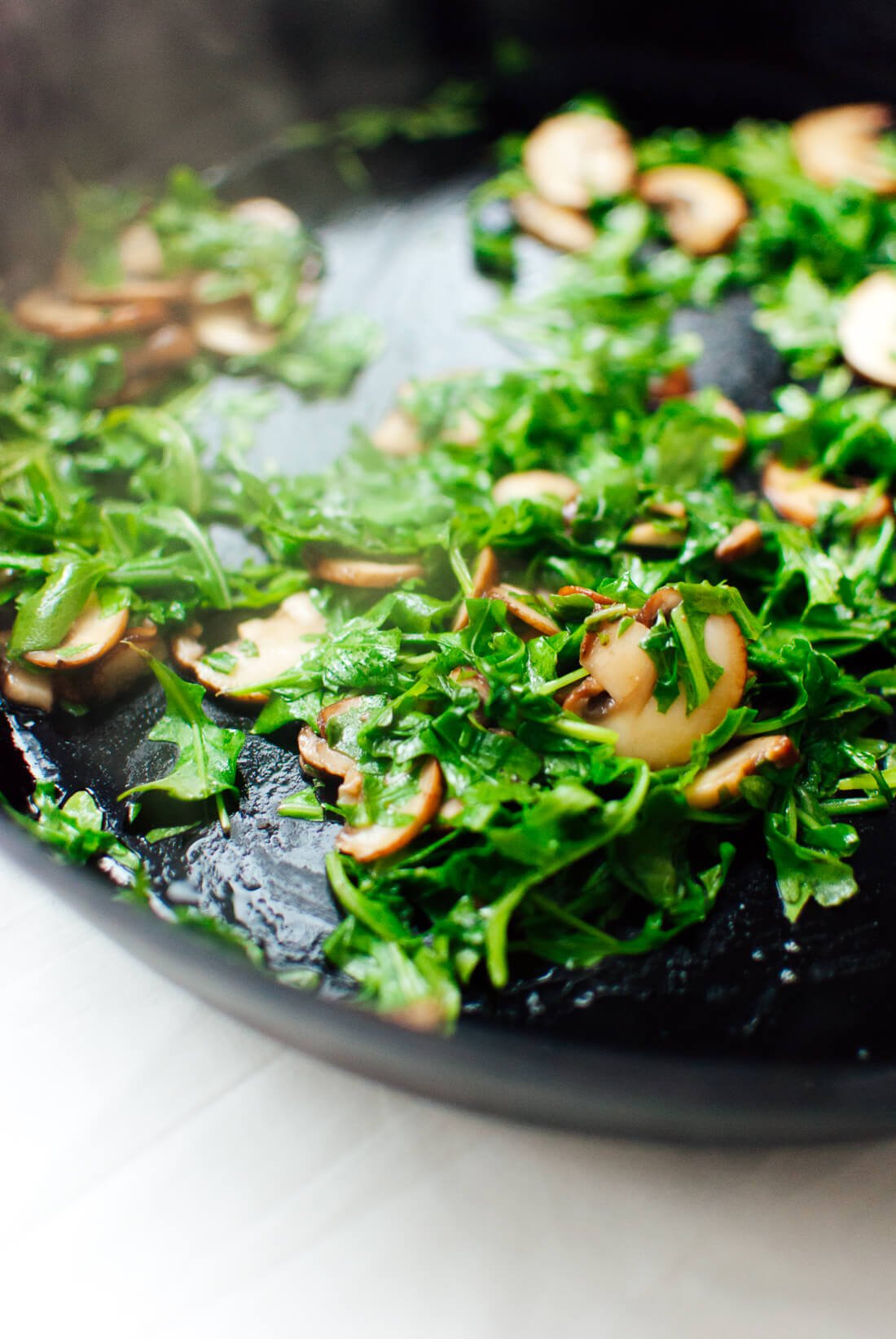 sautéed mushrooms and arugula