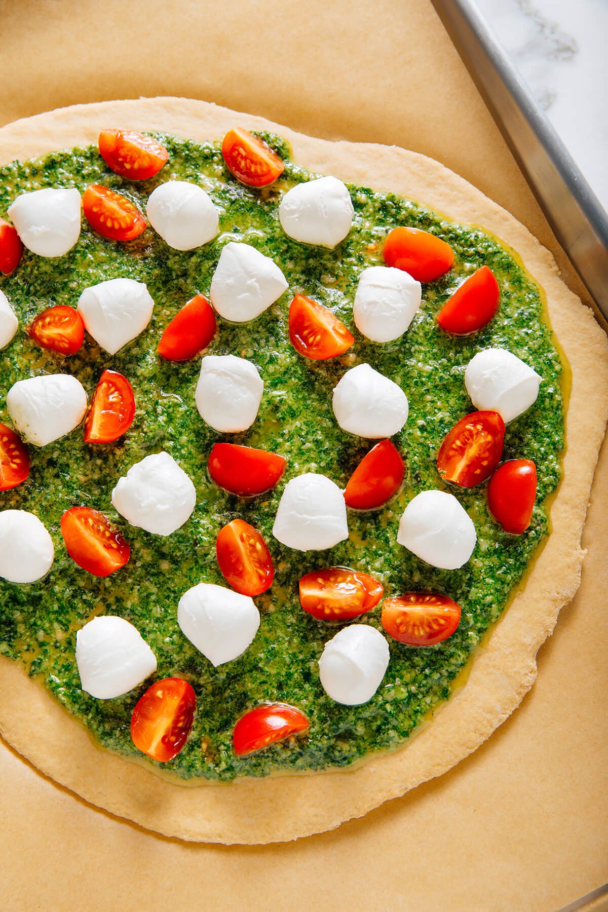 pesto pizza before baking