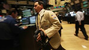 Traders work on the floor of the New York Stock Exchange on Nov. 4, 2010.
