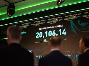 The S&P TSX composite index screen at the TMX Market Centre in downtown Toronto is photographed on Friday, November 11, 2022.  THE CANADIAN PRESS/ Tijana Martin