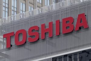 FILE - The logo of Toshiba Corp. is seen at a company's building in Kawasaki near Tokyo, on Feb. 19, 2022. Toshiba announced a 2 trillion yen ($14 billion) tender offer on Monday, Aug. 7, 2023, in a move that will take it private, as the scandal-tarnished Japanese electronics and energy giant seeks to turn itself around. (AP Photo/Shuji Kajiyama, File)