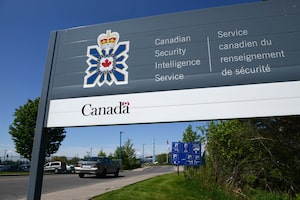 A sign for the Canadian Security Intelligence Service building is shown in Ottawa, Tuesday, May 14, 2013. THE CANADIAN PRESS/Sean Kilpatrick