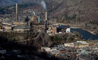 Teck's zinc and lead smelting and refining complex, left, is pictured in Trail, B.C., on Monday Nov. 26, 2012. THE CANADIAN PRESS/Darryl Dyck
