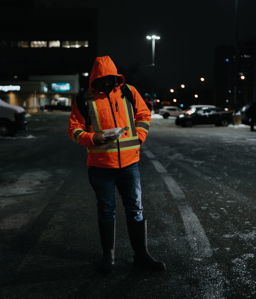 Alejandro from Mexico waits at a Toronto parking lot to be picked up for a construction job. Since coming to Canada on a tourist visa, Alejandro has earned money to send back to his wife and children in Mexico.