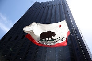SAN FRANCISCO, CALIFORNIA - MAY 09: A California flag flies in front of 555 California Street on May 09, 2023 in San Francisco, California. San Francisco's downtown has an estimated 18.4 million square feet of available real estate and continues to struggle with keeping retail and commercial properties rented out following the COVID-19 pandemic and lags behind all major cities in the U.S. and Canada.