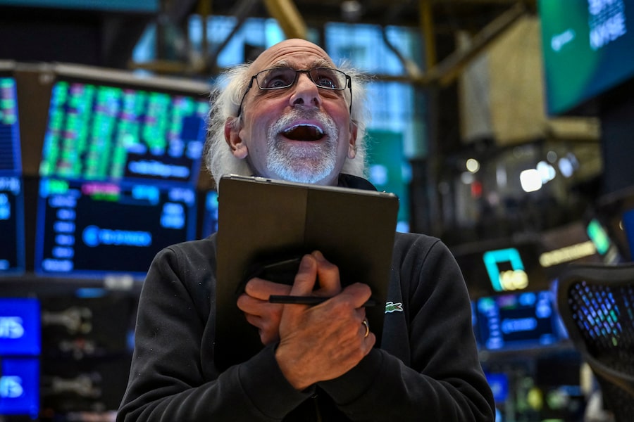A trader works on the floor of the New York Stock Exchange on April 9. Wall Street stocks closed higher Wednesday, with dramatic advances on all three major indexes as U.S. President Donald Trump delayed steep new tariffs hours after they took effect.