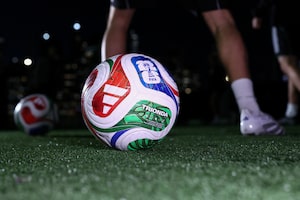 The 2026 FIFA Men's World Cup match ball named Trionda is pictured during its unveiling event in New York on October 2, 2025. The 2026 FIFA Men's World Cup is scheduled to take place between June and July 2026, with matches being hosted in Mexico, Canada and the US. (Photo by CHARLY TRIBALLEAU / AFP) (Photo by CHARLY TRIBALLEAU/AFP via Getty Images)