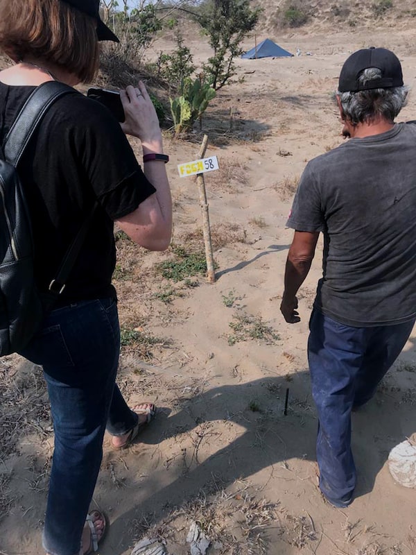 Globe reporter Stephanie Nolen walks and documents the grounds of Colinas de Santa Fe with Guadalupe Contreras